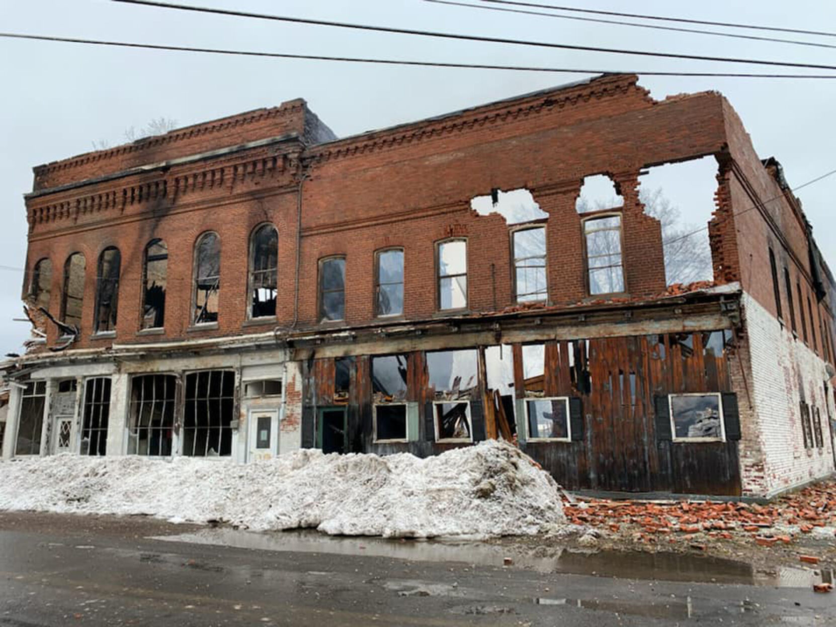 Turin hopes history repeats, new building rises from Brick Block fire